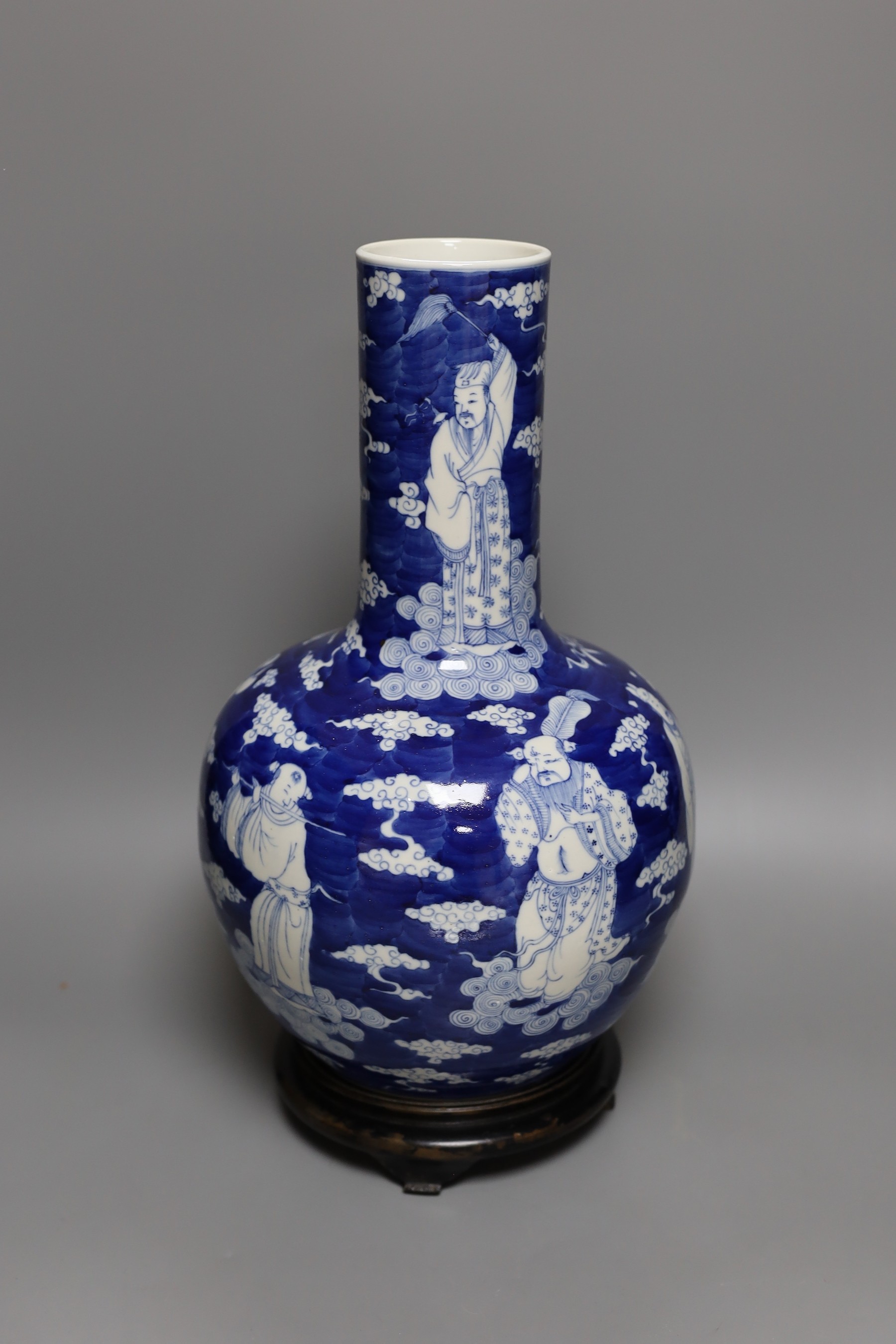 A Chinese baluster vase in underglaze blue, on stand, total height 40cm